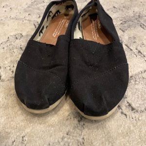 Toms women’s black slip on.